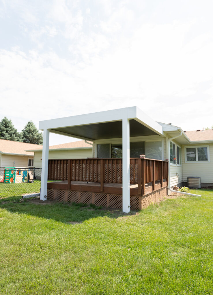 covered deck with a pergola