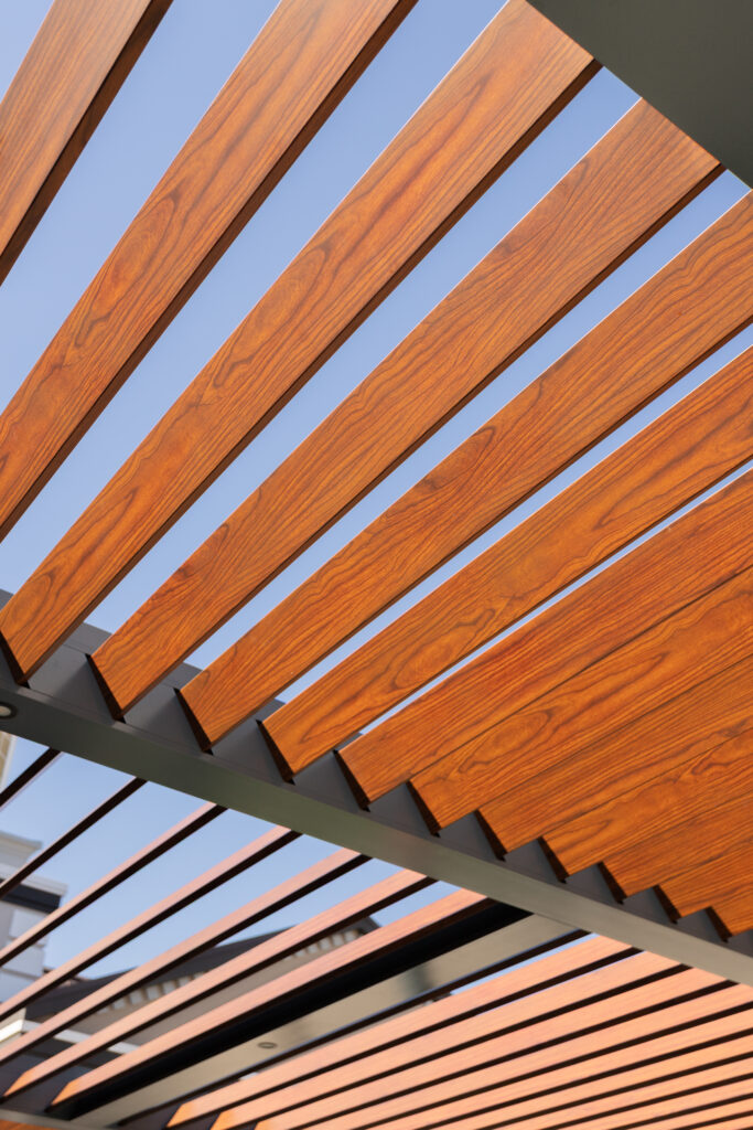 custom wood-grain pergola louvers