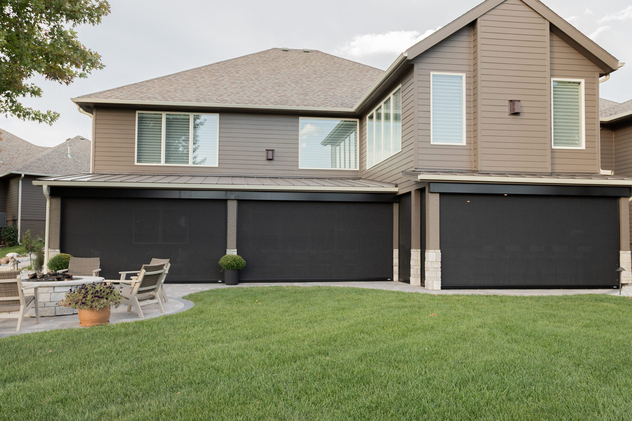 retractable patio screens in the closed position, adding privacy to the patio