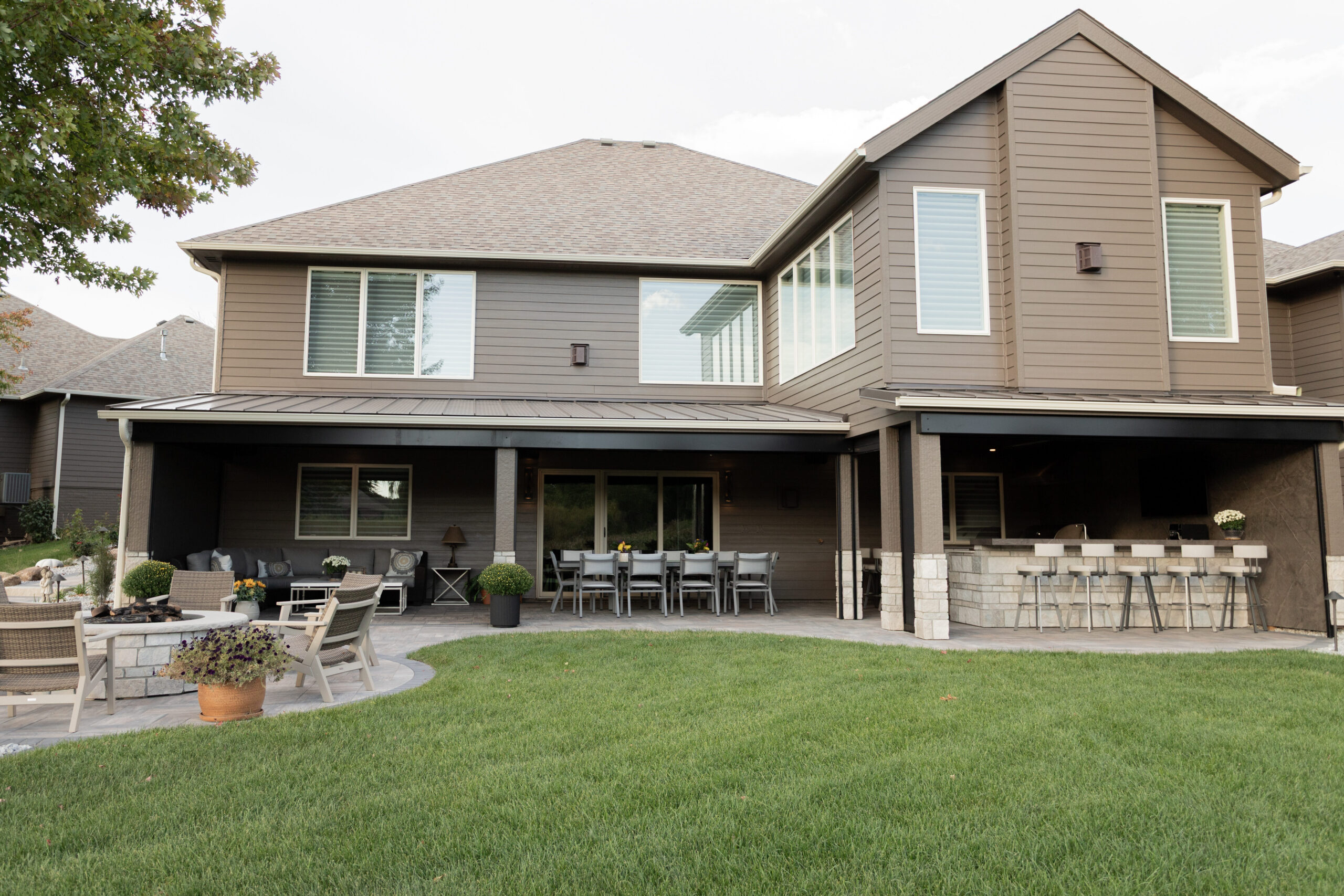 retractable patio screens in the up position, revealing the covered patio