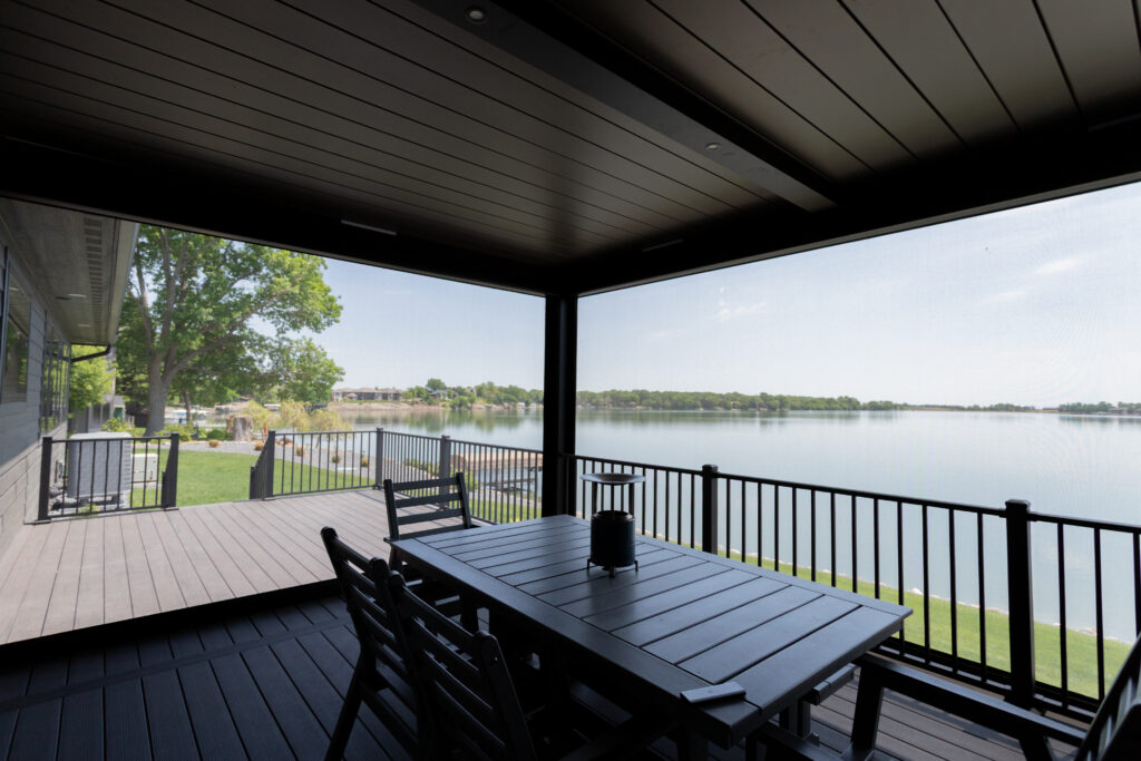 Wall Lake pergola with screens down and louvers closed to create shade