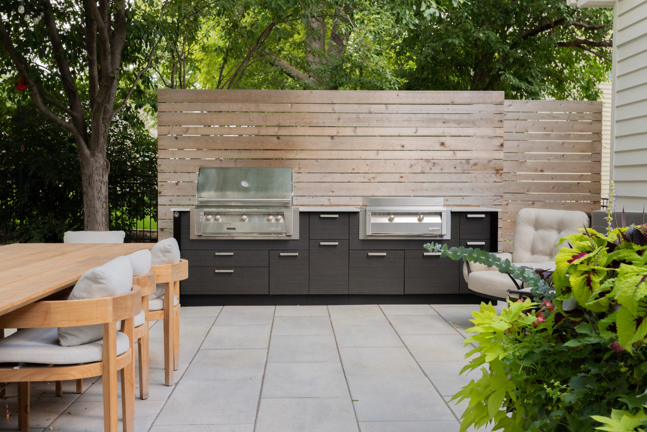 Custom outdoor kitchen with durable cabinetry and appliances